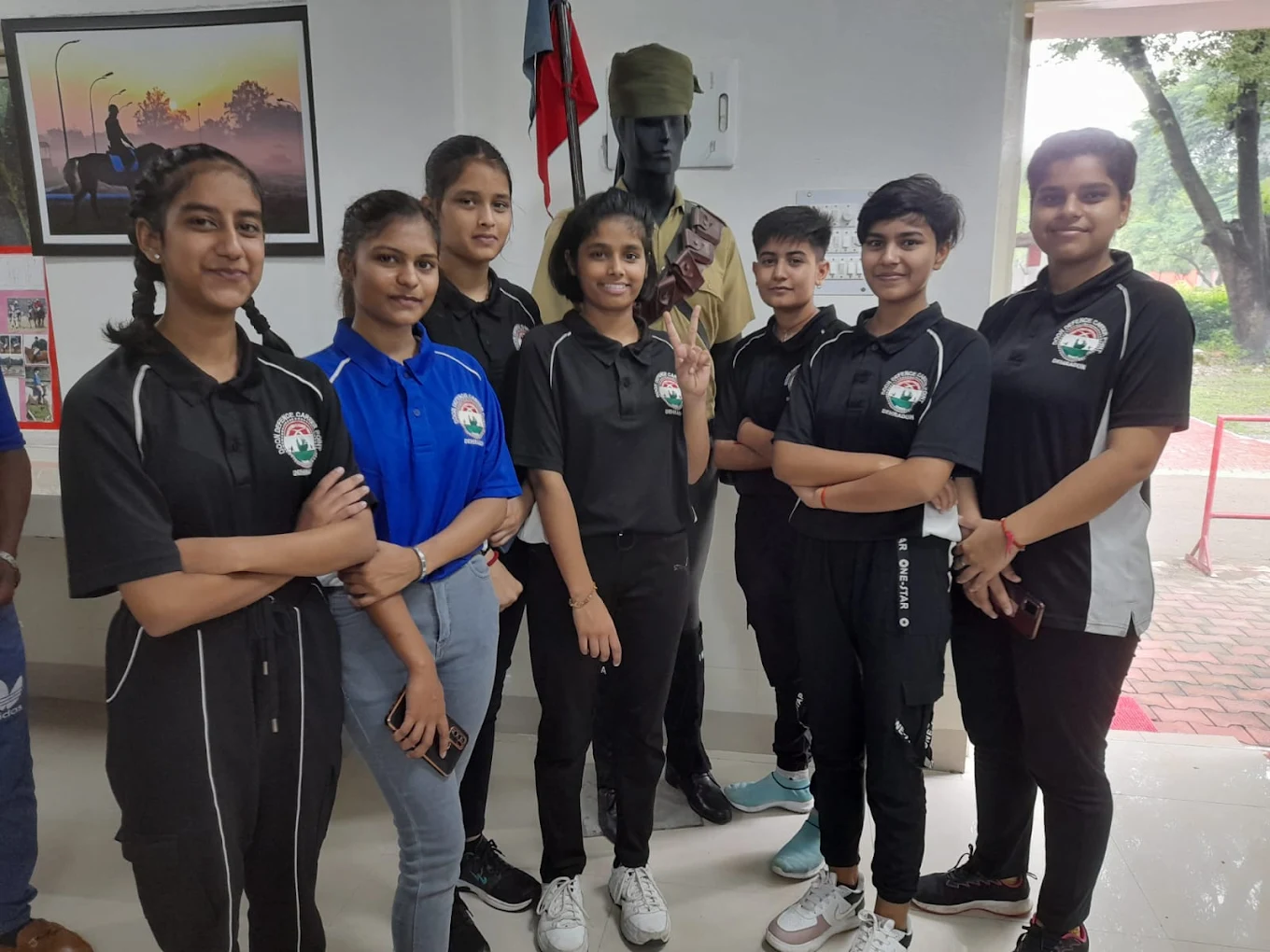 Girl cadets of Doon Defence Career Point Dehradun with SSB uniform display, preparing for NDA