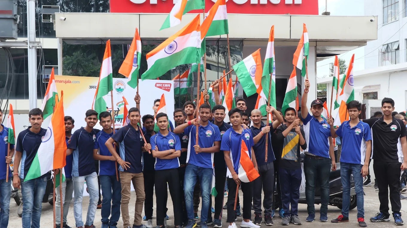 DDCP NDA Foundation cadets with the tricolor flag outside the academy